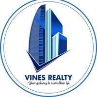 VINES REALTY Logo
